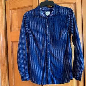 Womens size M blue long sleeve blouse with white stars.